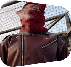 ARTA close-up in a red mask and glasses